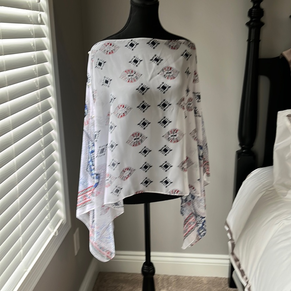Cover up/poncho. Perfect to spice up a fitted dress or even jeans and a tank top